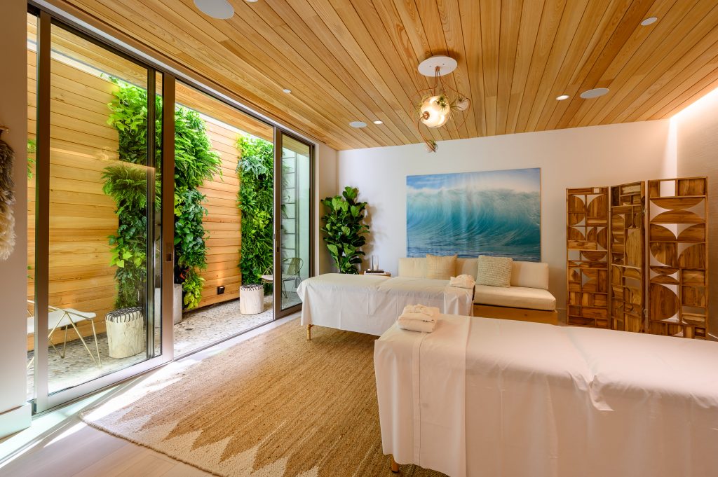 Massage room with wood panels